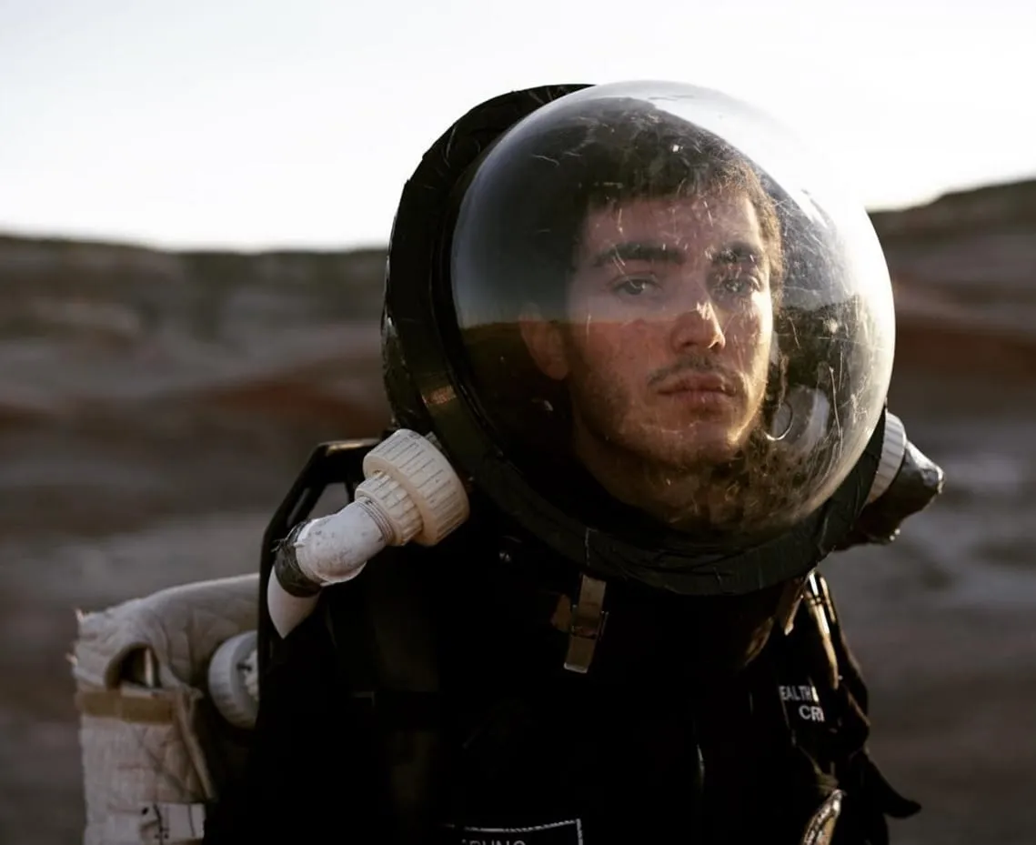 Marcos Bruno wearing an analog astronaut suit in the Utah desert